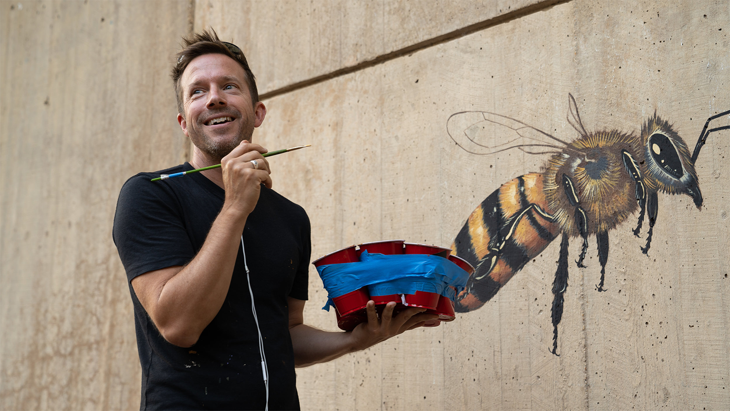 Artist, advocate creates bee mural at the National Zoo