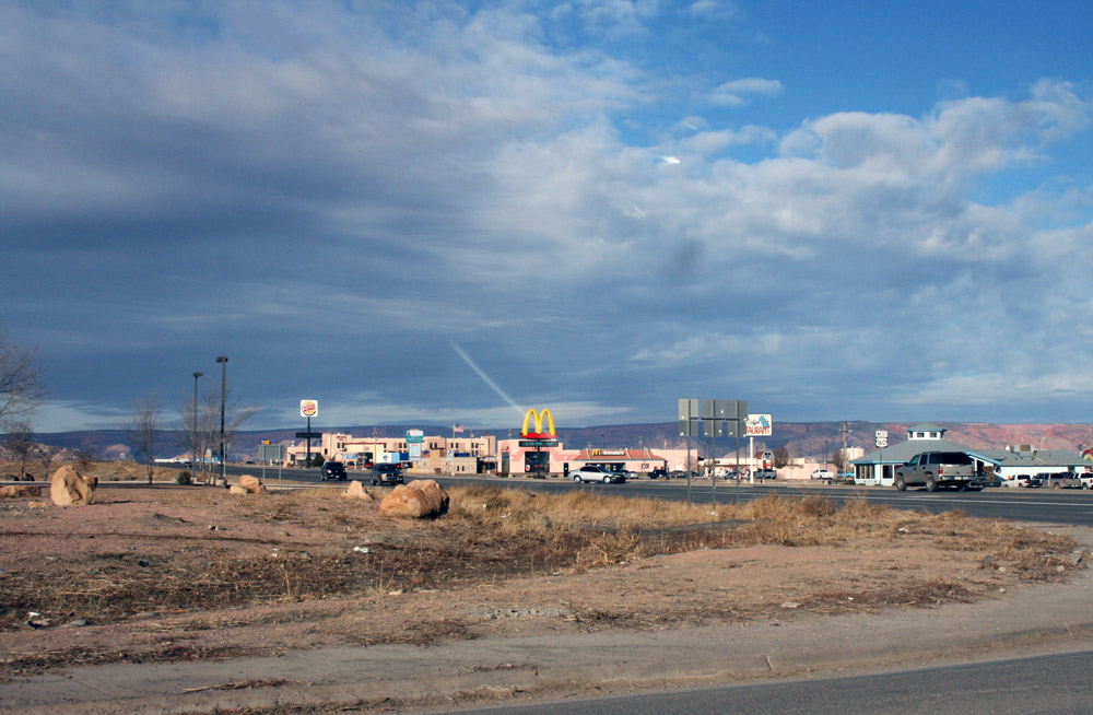 A strip of businesses including chain restaurants like McDonalds in Kayenta, AZ
