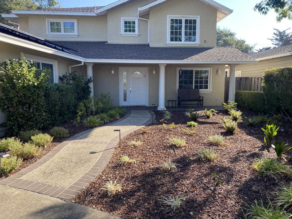 Mia's house in California before and after removing her green lawn. 