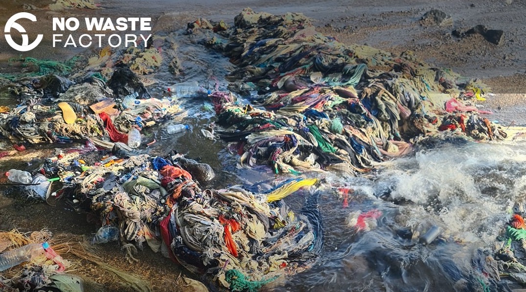 Wasted textiles wash up on a littered shore.