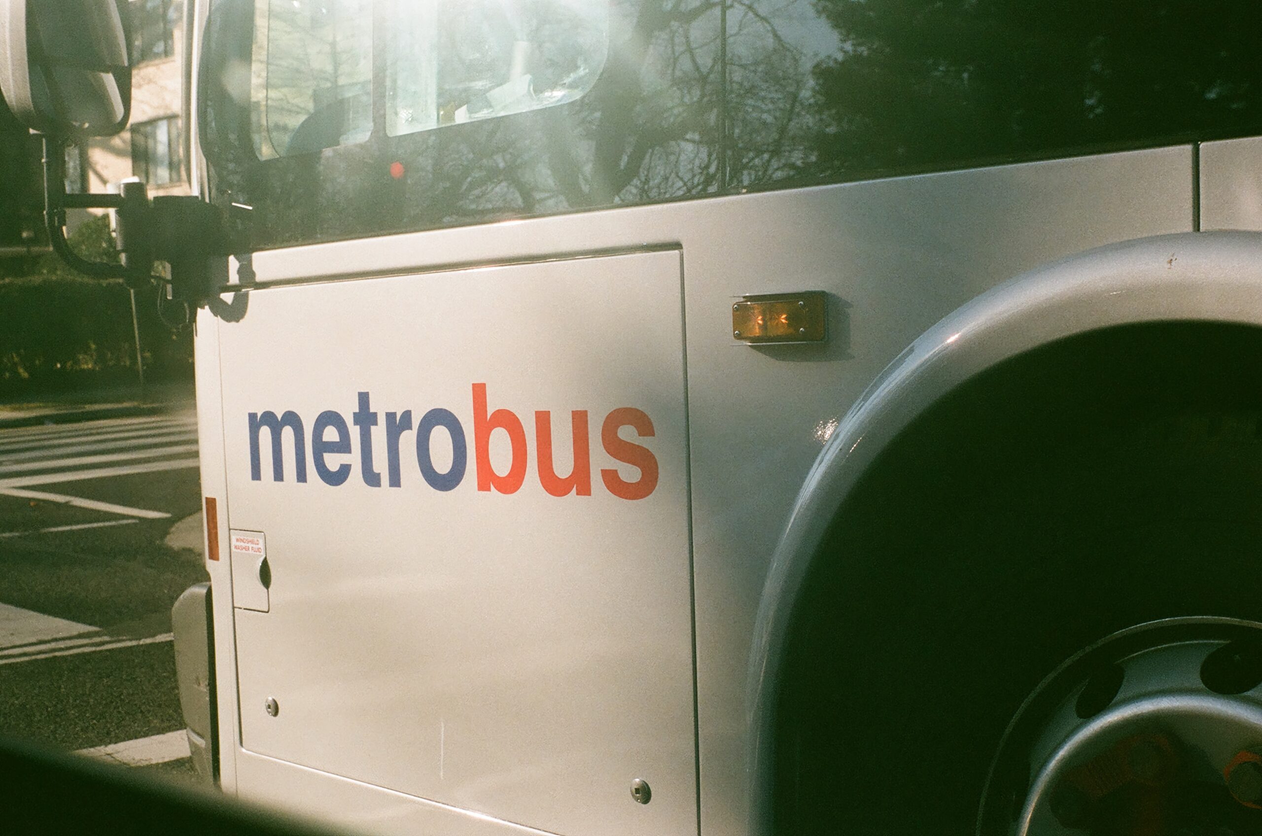 A close up shot of a white DC MetroBus
