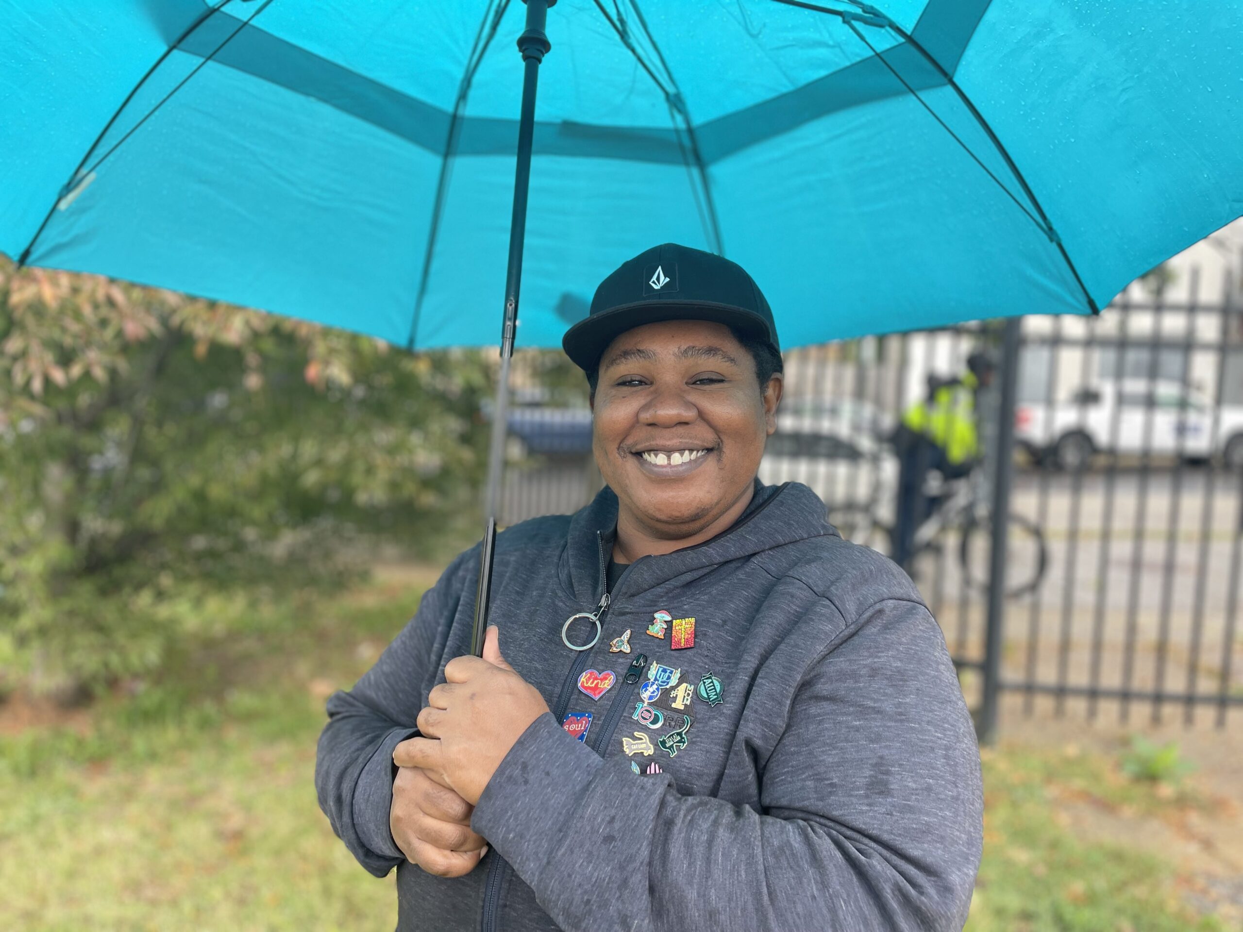 Shonta’ High in Bruce Monroe Park Oct. 7 adorned in her expressive mural of pins. “I love pins. And this lady actually gave me these two. Cause she was like, you're such a kind soul,” she said. “I put it right in the way she said it. ‘Kind soul.’ I love that.” 