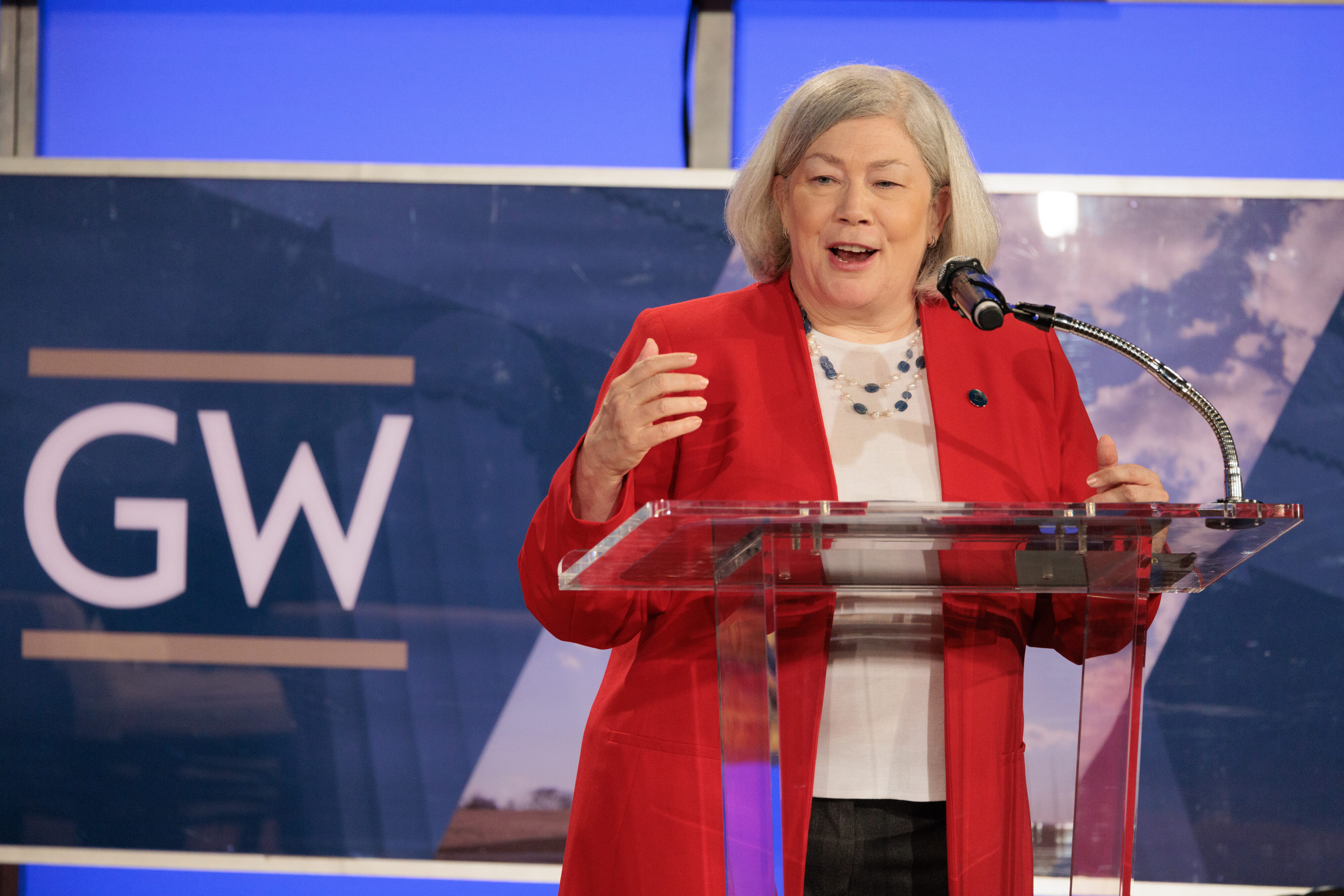 George Washington University President Ellen Granberg delivers a welcoming statement, celebrating the work of Planet Forward student contributors and correspondents. 