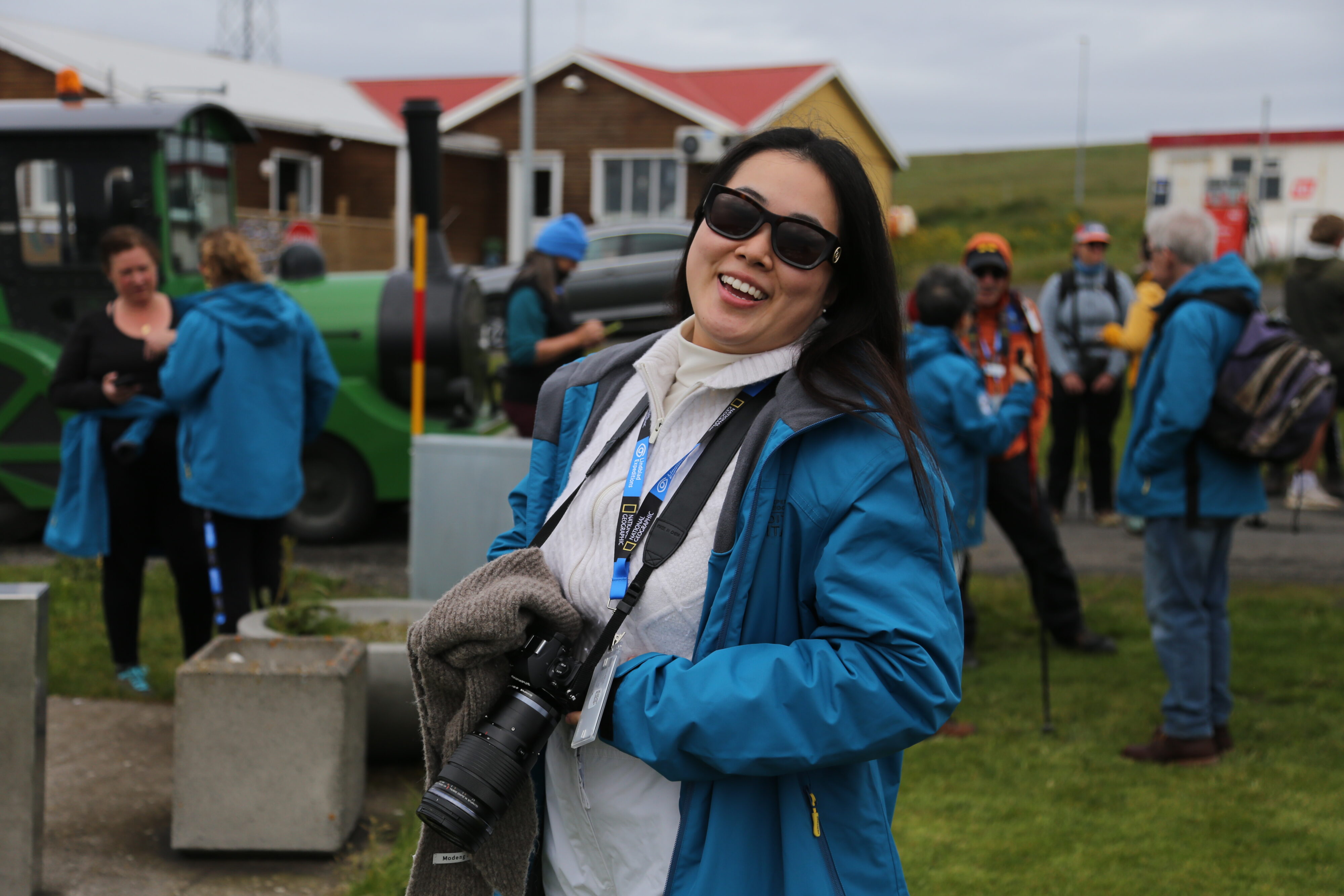 Portrait photo of Delan Li at a town in Iceland.